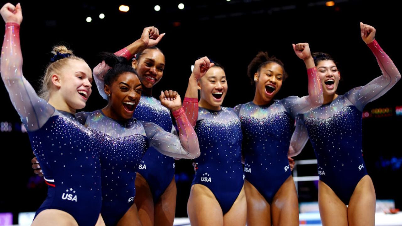 Simone Biles helped the U.S. women to a record seventh world gymnastics title.