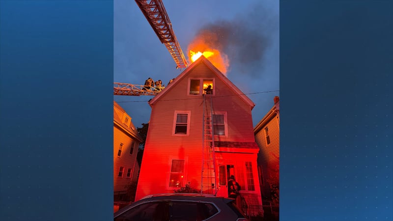 PHOTOS: Fire crews battle flames at a residence in Dorchester