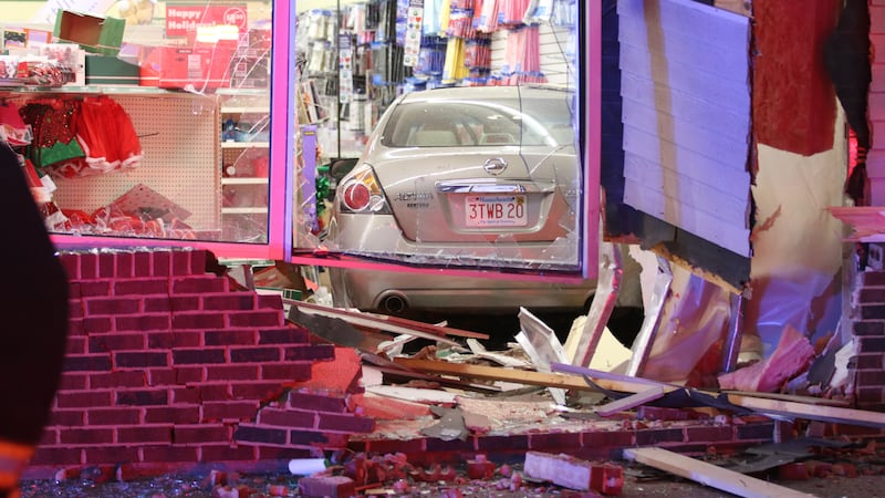 Woman suffers minor injuries after driving into a Dollar Tree in Worcester