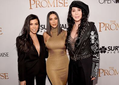 HOLLYWOOD, CA - APRIL 12: TV personalities Kourtney Kardashian, Kim Kardashian West, and actor/singer Cher attend the premiere of Open Road Films' "The Promise" at TCL Chinese Theatre on April 12, 2017 in Hollywood, California. (Photo by Kevork Djansezian/Getty Images)