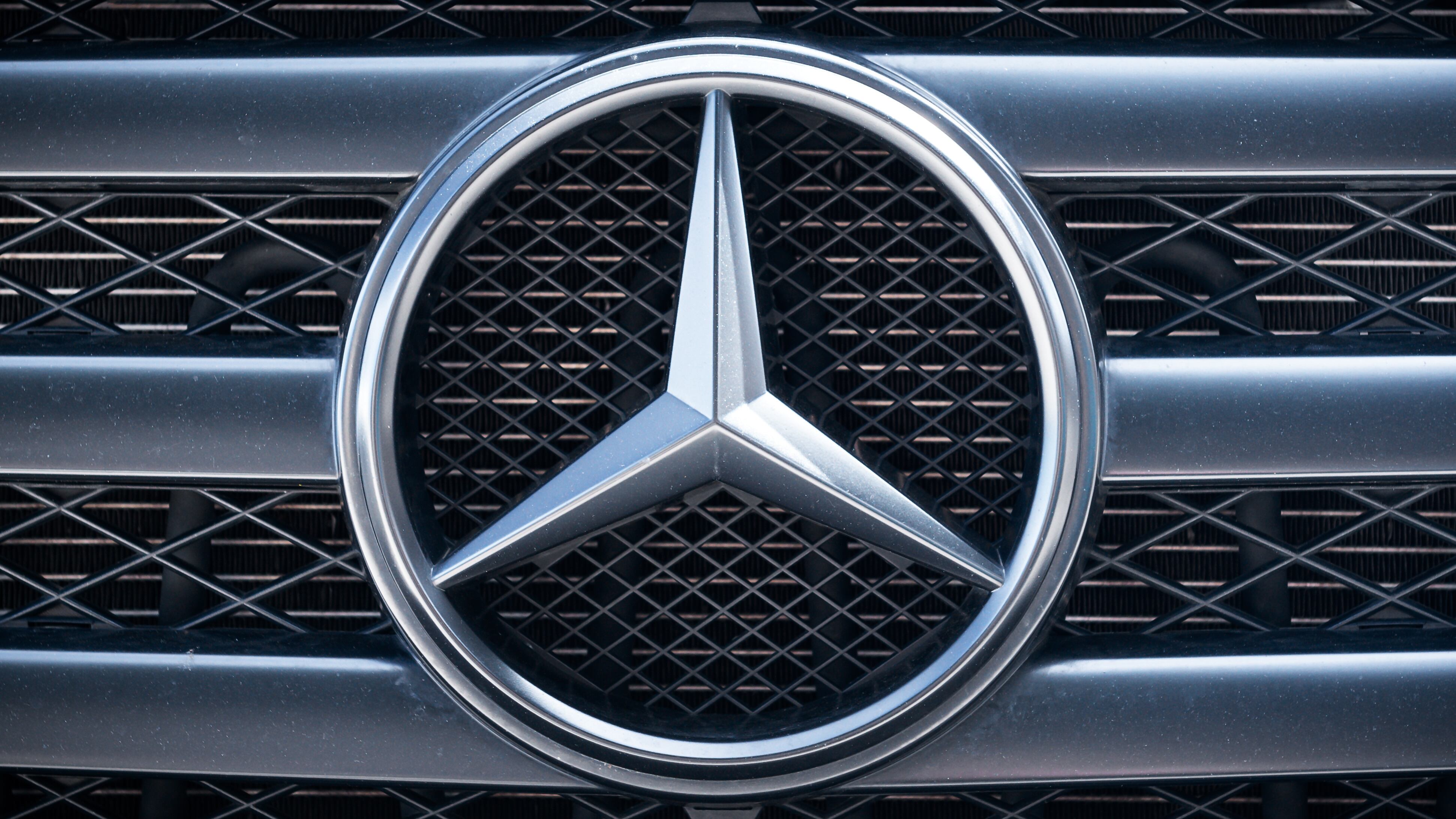 Mercedes Benz logo close-up on the car