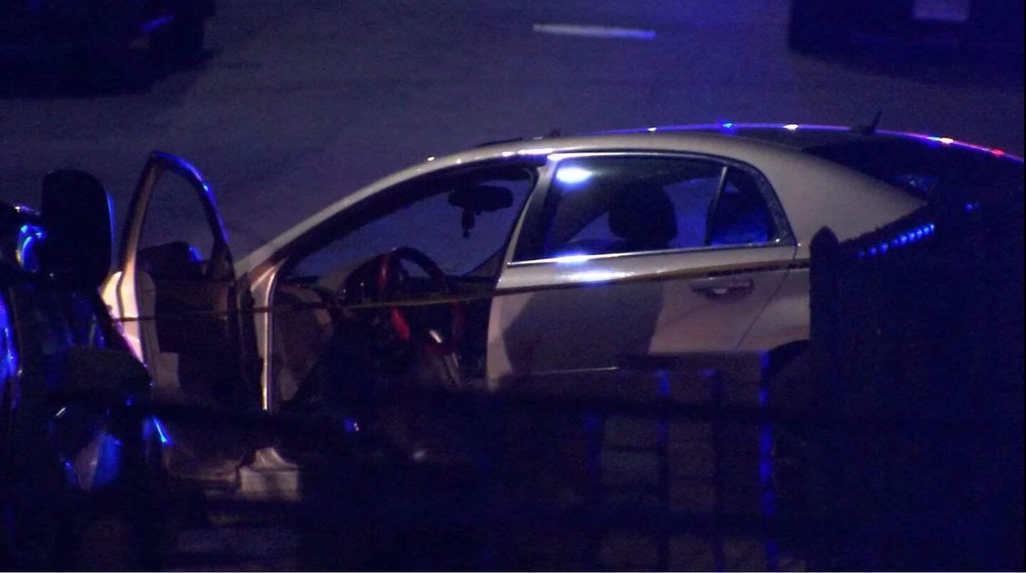 Police appear to be focusing on a car with blood smeared on the door on Frazer Street.