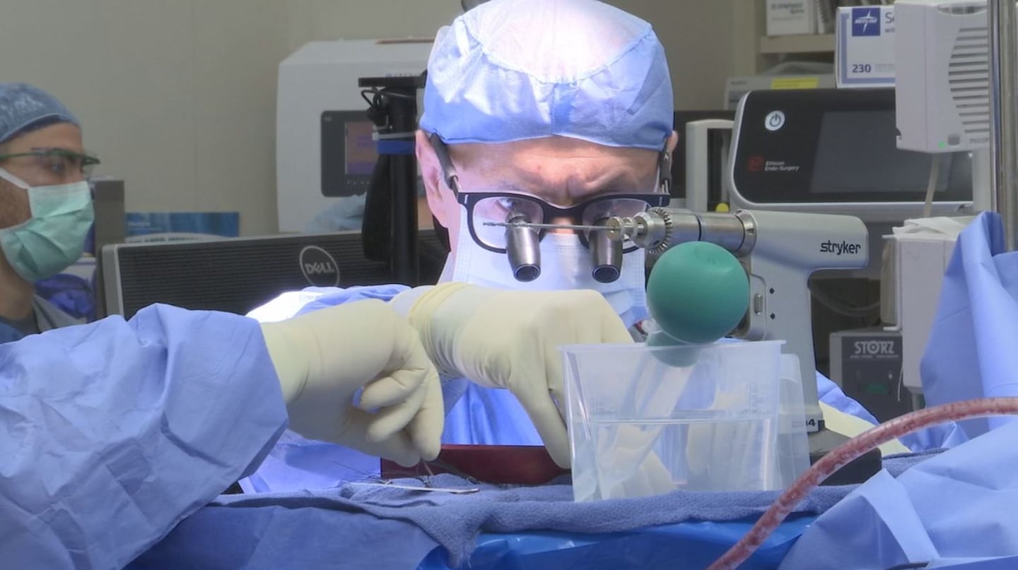 Surgeons at UMass Memorial Medical Center in Worcester, Massachusetts use robotic tools to assist in a brain procedure on a epilepsy patient.