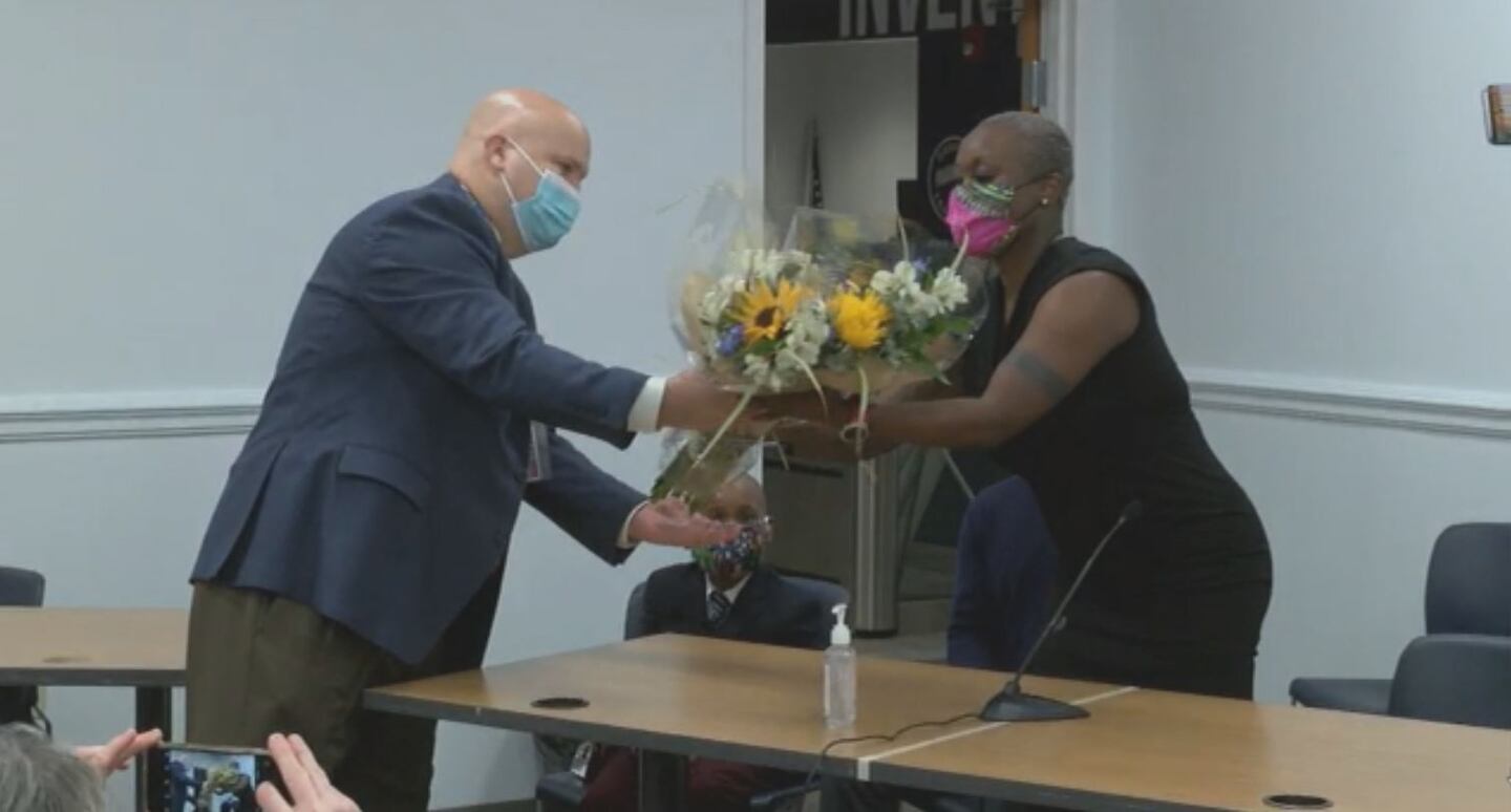 Jennifer Hedrington, a 7th-grade math teacher at Ferryway School in Malden, was named Massachusetts' 2021 Teacher of The Year Tuesday. She got a bouquet of flowers from DESE Commissioner Jeffrey C. Riley when the honor was announced.