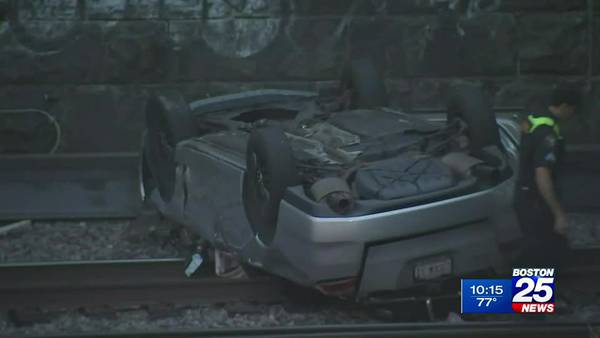 Car falls 40 feet onto Commuter Rail tracks in Boston