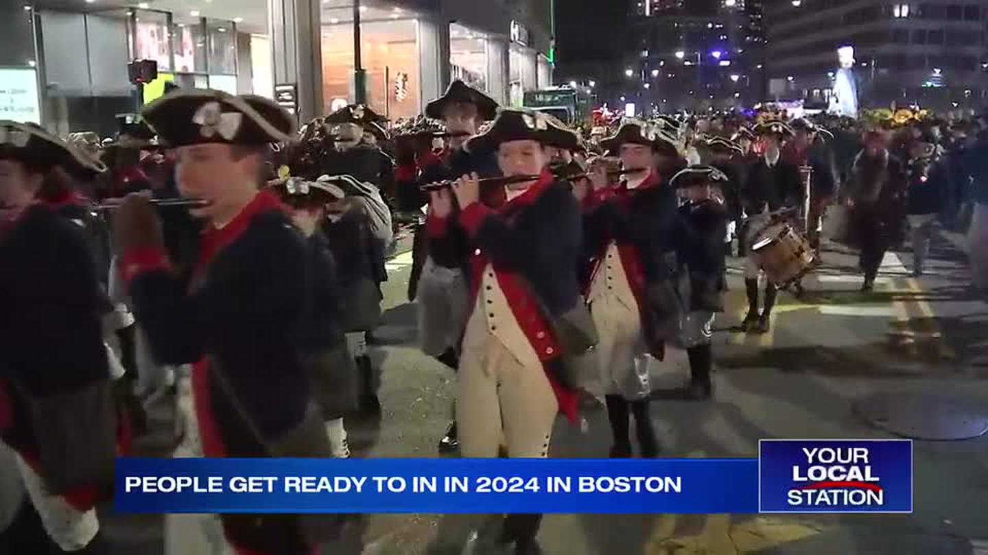 New Year's Eve revelers ring in 2024 with a parade, music and fireworks