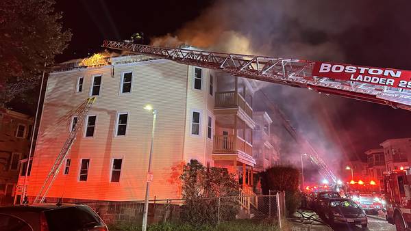 Firefighter injured, 13 people displaced after blaze tears through Boston triple-decker