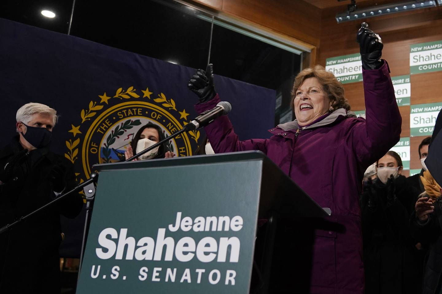 Incumbent U.S. Sen. Jeanne Shaheen, D-N.H., raises her arms after claiming victory at a gathering with supporters, Tuesday, Nov. 3, 2020, in Manchester, N.H. Shaheen faced Republican businessman Corky Messner. (AP Photo/Charles Krupa)