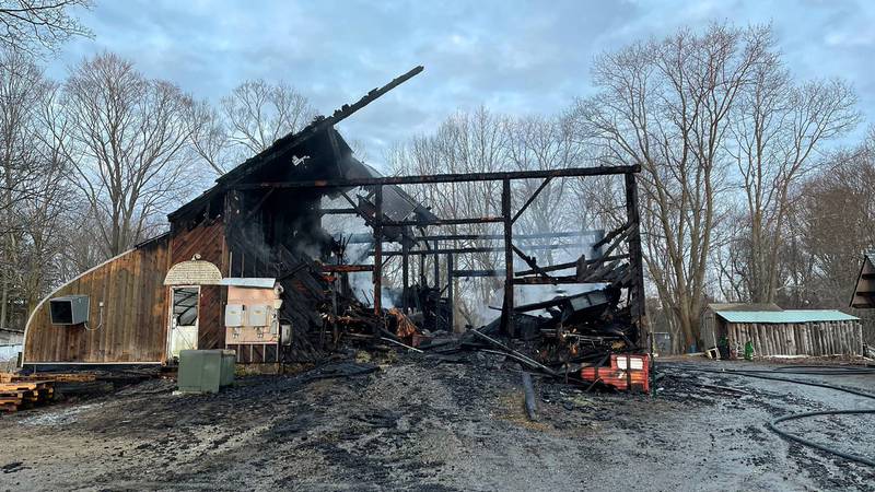 A barn built in 1815 was destroyed in an overnight fire at the Natick Community Organic Farm.
