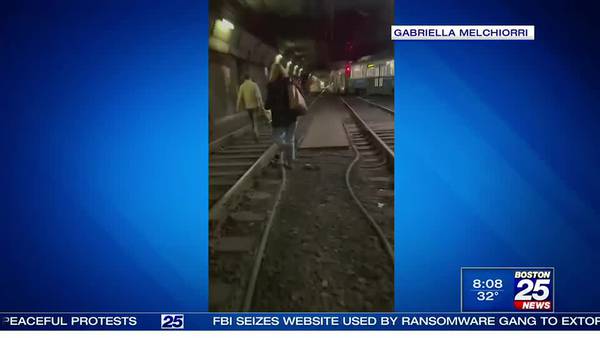 Video shows commuters hiking along tracks after Green Line trains evacuated in tunnel