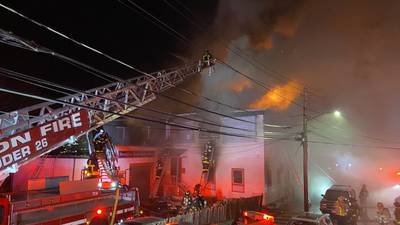 Photos: Firefighters battle large fire on Corey Road in Brighton